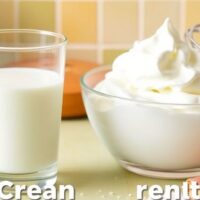 Milk and whipped cream in a bright kitchen setting.